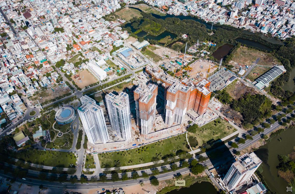 Cập nhật ECO GREEN SAIGON VƯỢT TIẾN ĐỘ XÂY DỰNG TRONG MÙA DỊCH COVID năm 2021 8 Toàn cảnh dự án từ trên cao với không gian xanh mát của cây xanh, hồ nước xung quanh